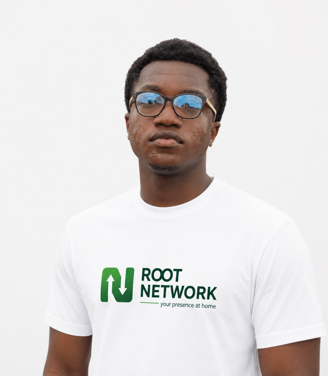 A second Root Network Field Associate wearing a Root Network shirt